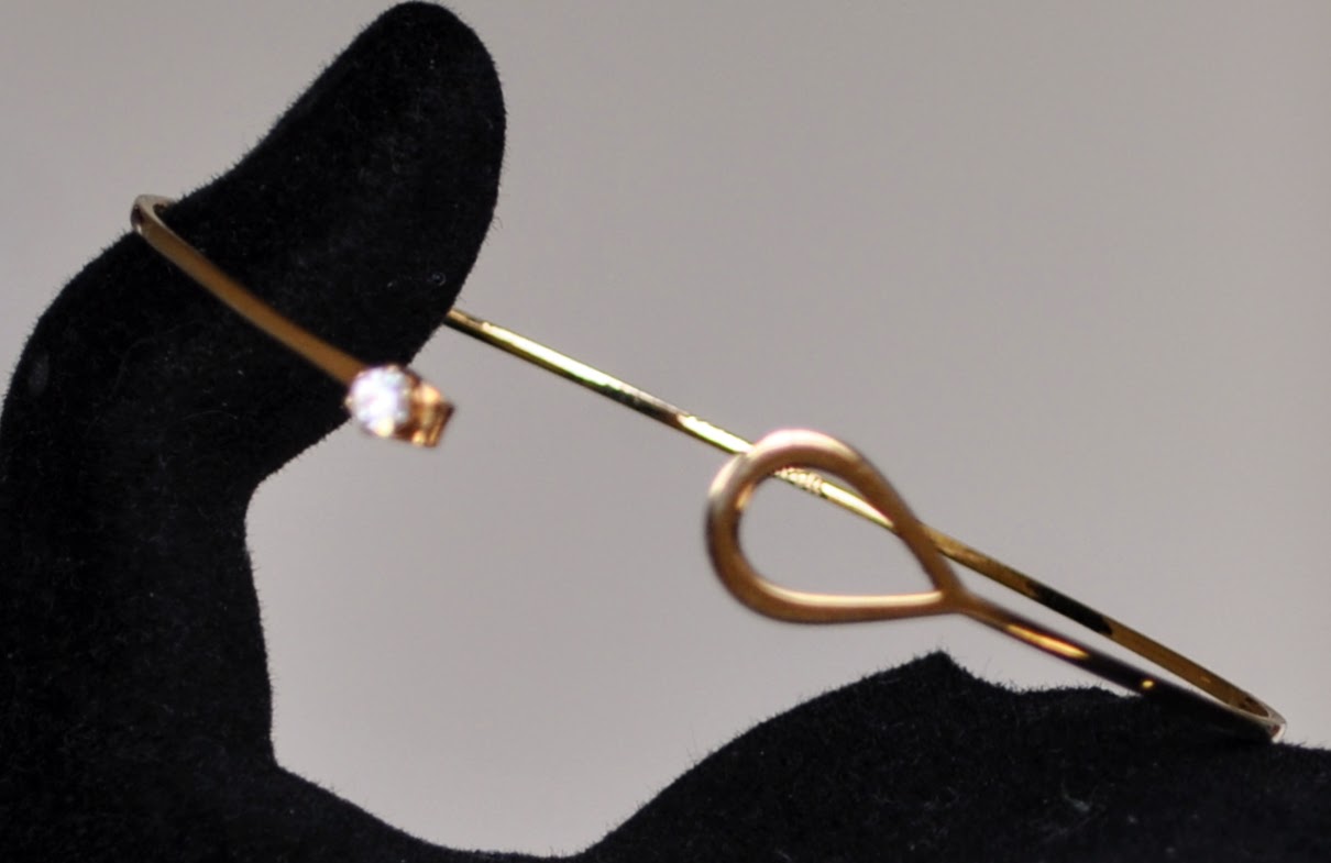 Elegant Avon Gold Tone Catch a Star Rhinestone Bracelet - 7" Length - Vintage 1970s Avon Signed Catch a Star Hook Style Closure Bangle