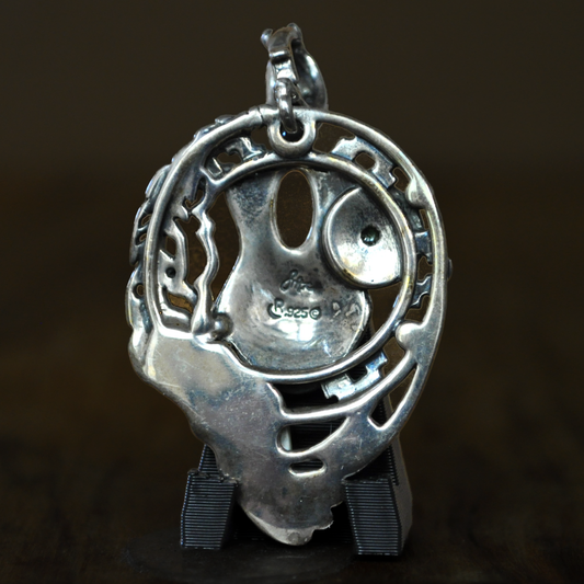 Sterling Silver Pendant Southwestern Tribal Motif Pottery Feather and Turquoise Accents - Natural Turquoise and Stone Feather Accents Sterling Silver Native Pride Pendant