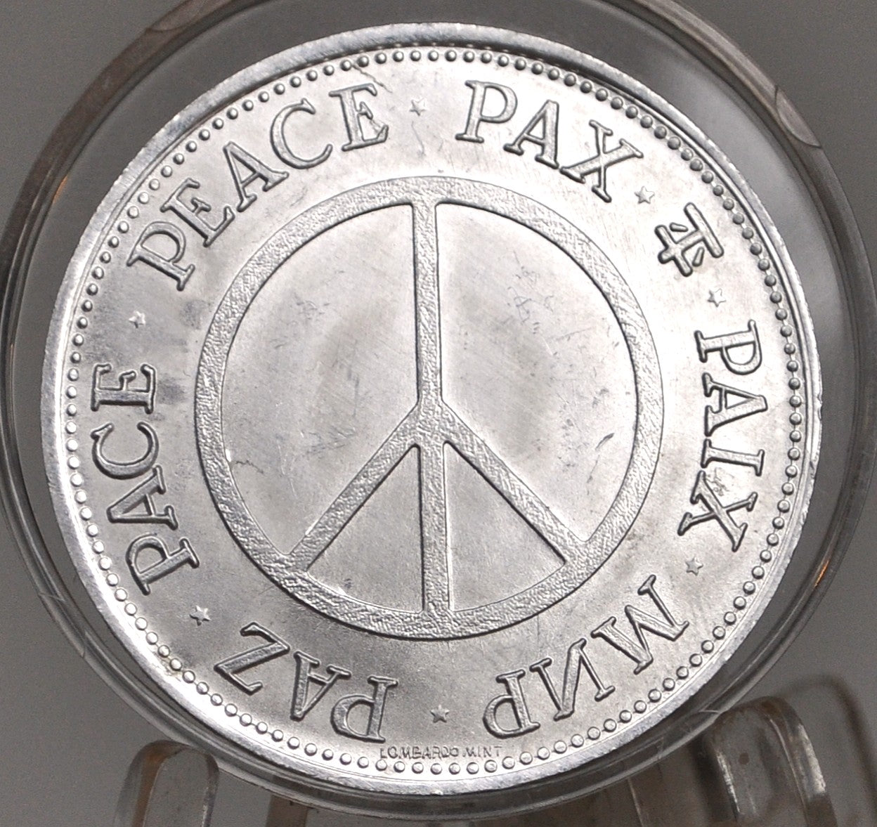 1970s Peace Now Medal - Peace Now Medal Featuring Peace in 7 Languages - Peace Now Medal featuring A globe with the Scales of justice and MLK and JFK