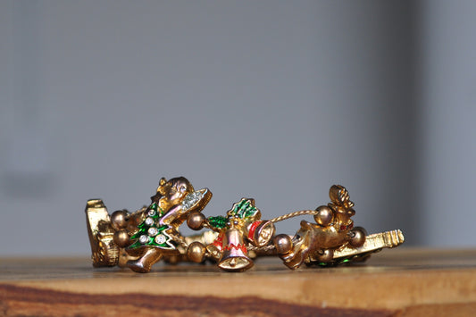 Festive Tofa Gold Tone Enamel Sliding Charm Christmas Bracelet - 8 Inches - Presents, Trees, Bells