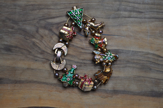 Festive Tofa Gold Tone Enamel Sliding Charm Christmas Bracelet - 8 Inches - Presents, Trees, Bells