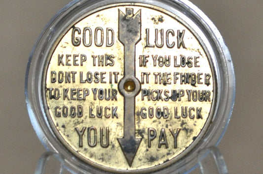 "Packaged for Pleasure" 50th Anniversary Cartan Tours Souvenir Token - Cartan Tours Anniversary, Goodluck, and Spinner Token