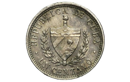 Silver coin with 'Republica de Cuba' text and coat of arms on a black background
