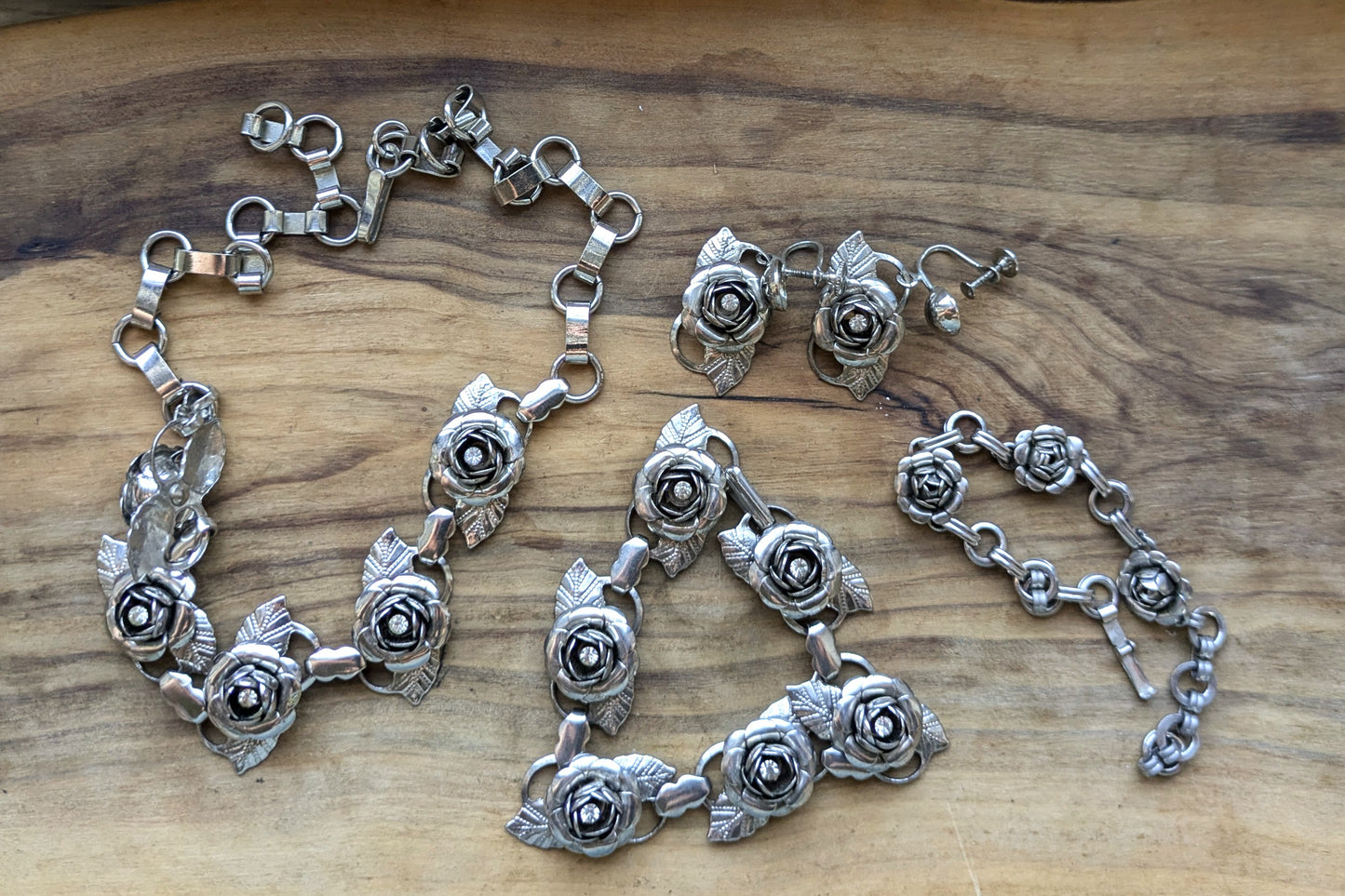 Set of Silvertone Rose Rhinestone Jewelry - Necklaces, Bracelets, & Earrings - Silver Rose Jewelry