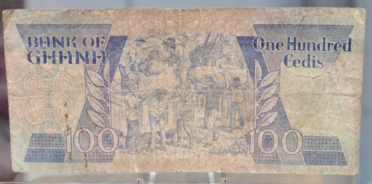 1984 Bank of Ghana 100 Cedis Note - Earlier Issue Date - Very Fine (VF) Grade, Writing - 1984 Ghana One Hundred Cedis Banknote - P#26a