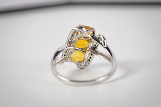 Three-Stone Yellow Gemstone Bypass Ring in 925 Sterling Silver, Size 8 - Sterling Silver Three-Stone Yellow and Black Accent Cocktail Ring