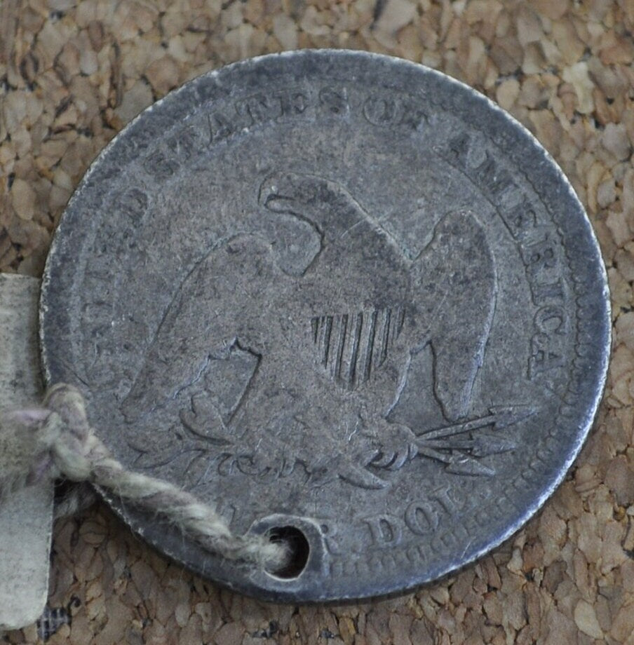 1854 Seated Liberty Quarter - G (Good) - 1854 Silver Quarter / 1854 Liberty Seated Quarter - Tagged May 4th 1881