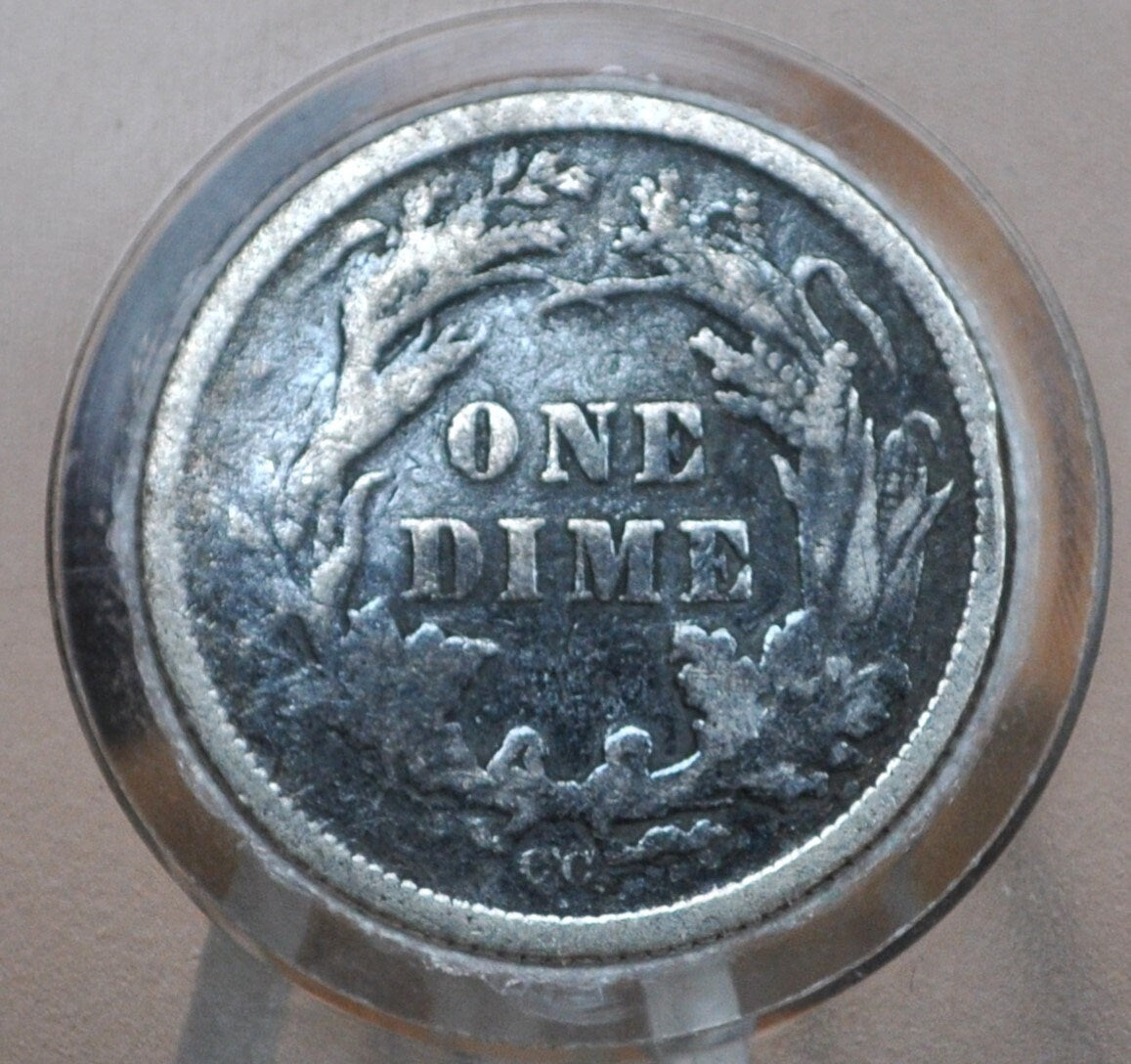 1877-CC Seated Liberty Dime - F/VF Details, Dented - Carson City Mint - 1877CC Silver Dime / 1877 Liberty Dime - Carson City Nevada