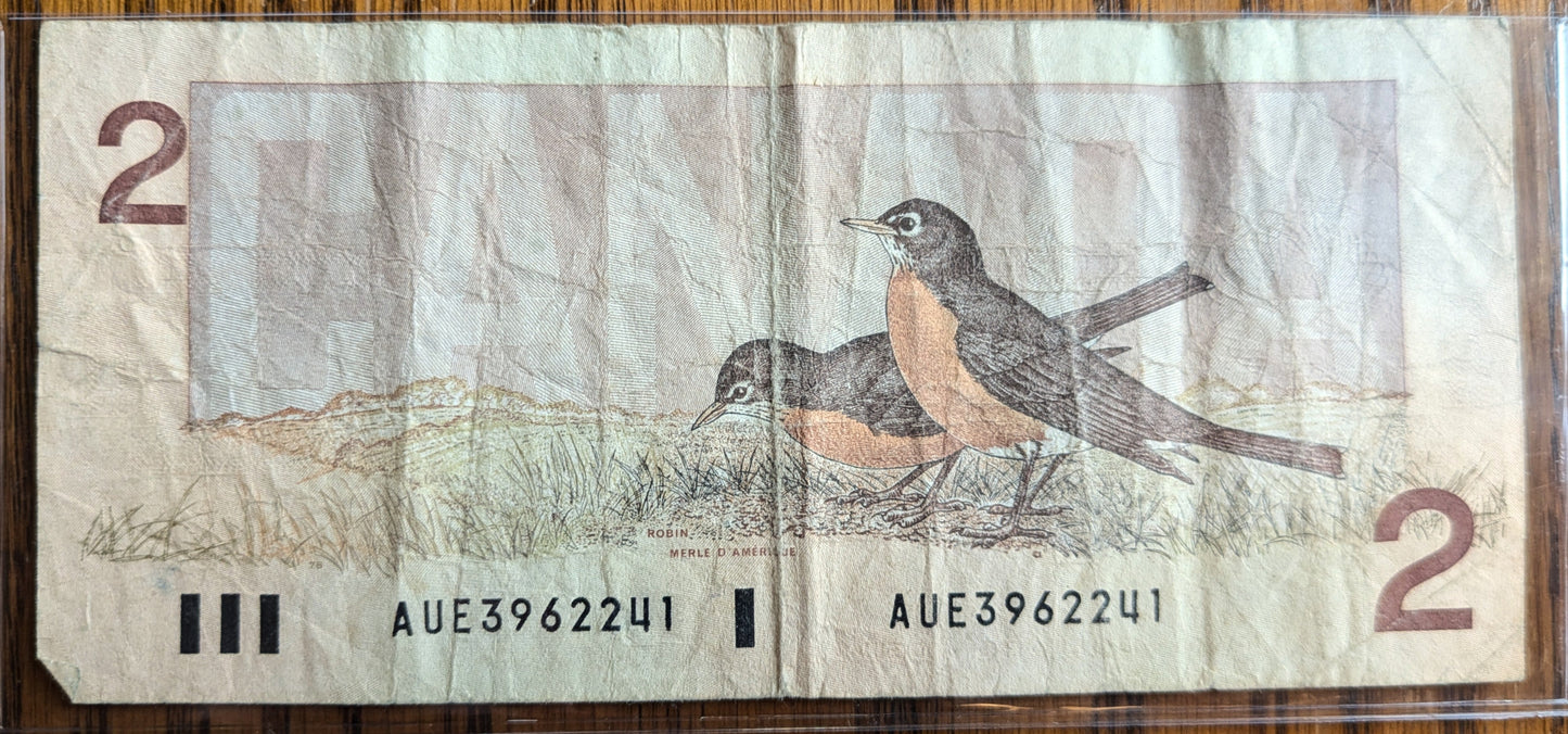 1986 Canadian 2 Dollar Banknote - Choice of Grade - Thiessen/Crow or Crow/Bouey Signed - 1986 Canada Two Dollar Bill - P#94a/P#94b