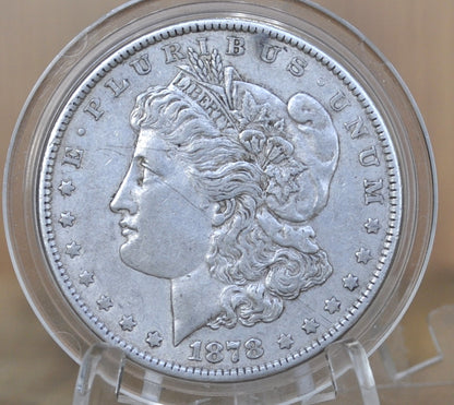 1878 Morgan Silver Dollar Reverse of 79 - Seven Feathers - AU50 (About Uncirculated) Grade - 1878 Seven Feathers - 7 Tailfeathers Reverse of 1879