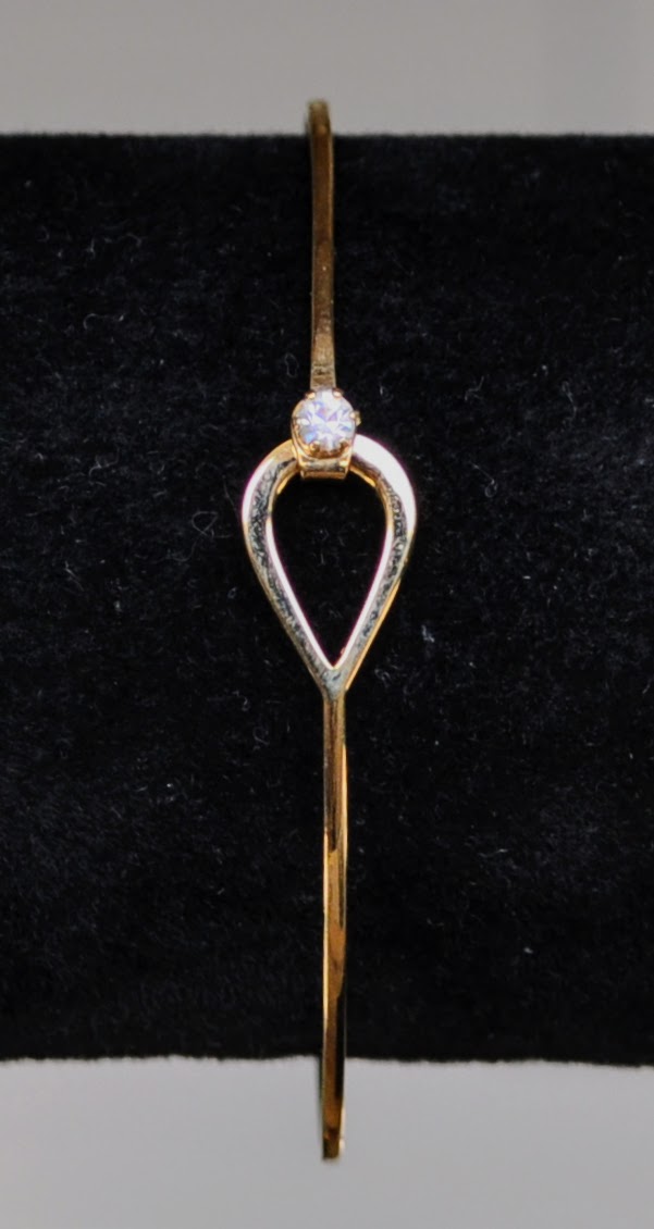 Elegant Avon Gold Tone Catch a Star Rhinestone Bracelet - 7" Length - Vintage 1970s Avon Signed Catch a Star Hook Style Closure Bangle