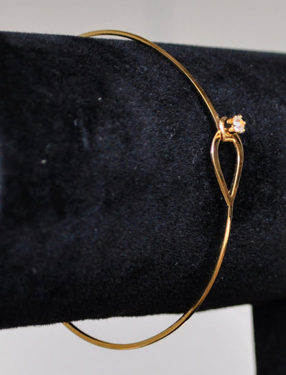 Elegant Avon Gold Tone Catch a Star Rhinestone Bracelet - 7" Length - Vintage 1970s Avon Signed Catch a Star Hook Style Closure Bangle