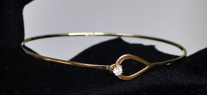 Elegant Avon Gold Tone Catch a Star Rhinestone Bracelet - 7" Length - Vintage 1970s Avon Signed Catch a Star Hook Style Closure Bangle