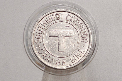 Boston MBTA Orange line transit token - Orange Line southwest corridor token opening May 1987