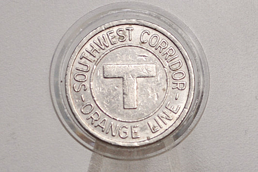 Boston MBTA Orange line transit token - Orange Line southwest corridor token opening May 1987