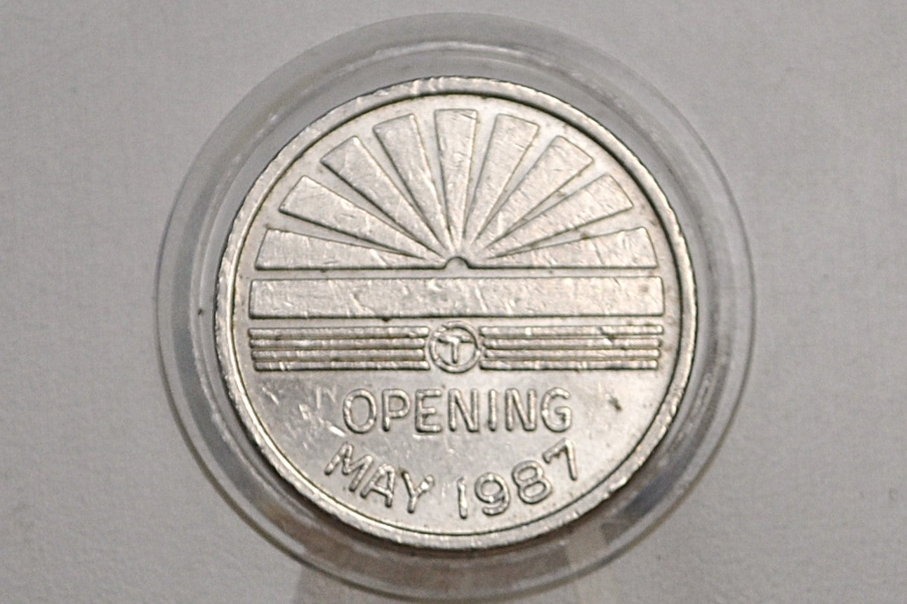 Boston MBTA Orange line transit token - Orange Line southwest corridor token opening May 1987