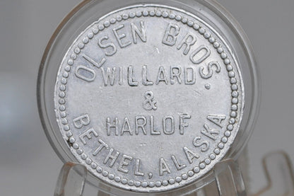Bethel, Alaska Aluminum Trade Token by Olsen Bros. Willard & Harlof - Olsen Bros. One Dollar Trade Token&