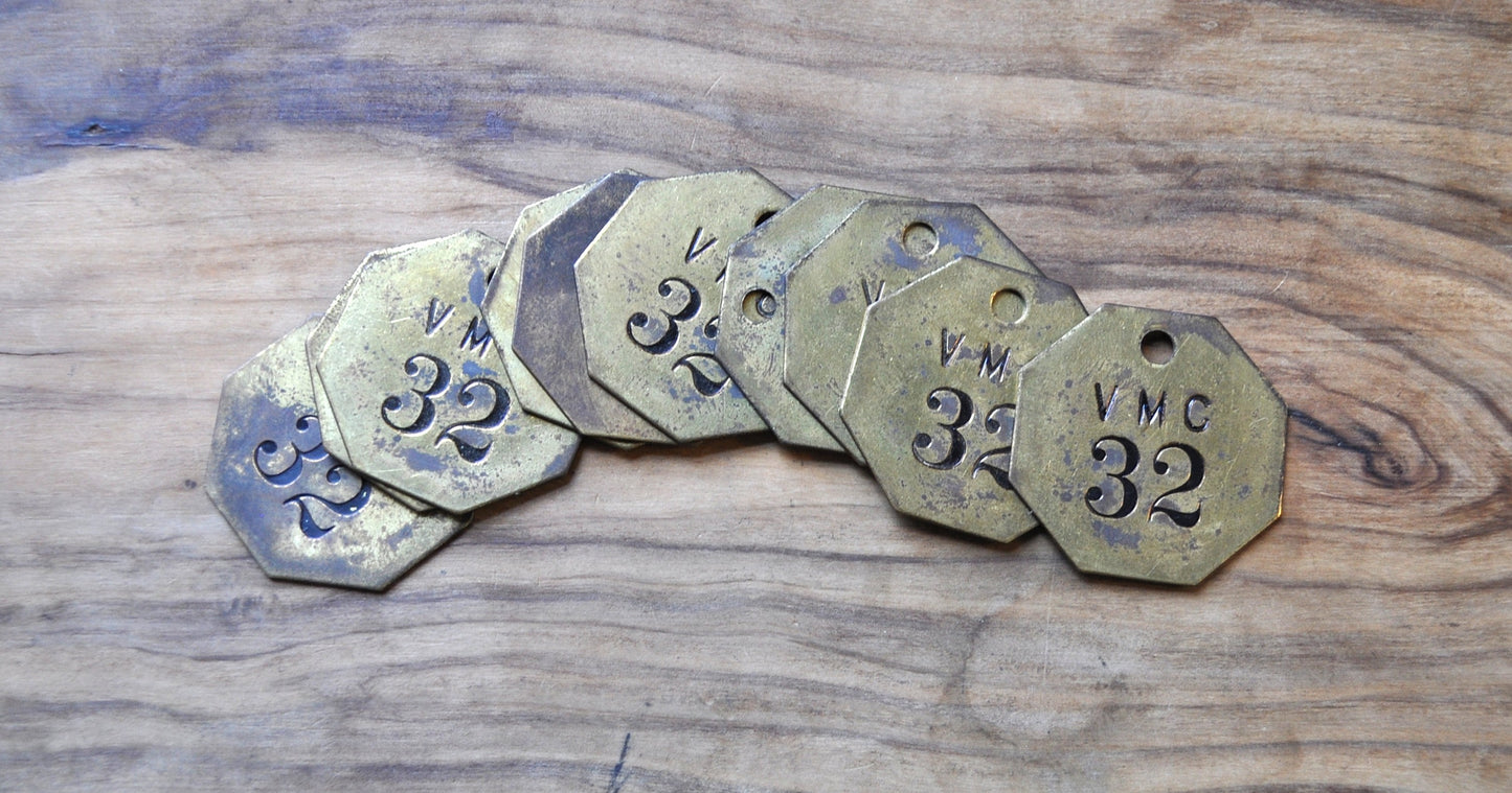 Vintage Brass "VMC 32" Lot of 10 Tags - Lot of Ten Vintage Brass tags from VMC, all labeled '32'