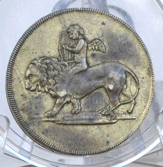 German Spielmark Woman and Angel Riding Lion with Harp Game Token - Woman/Angel Riding Lion with Harp German Speil Marke Token (ND)