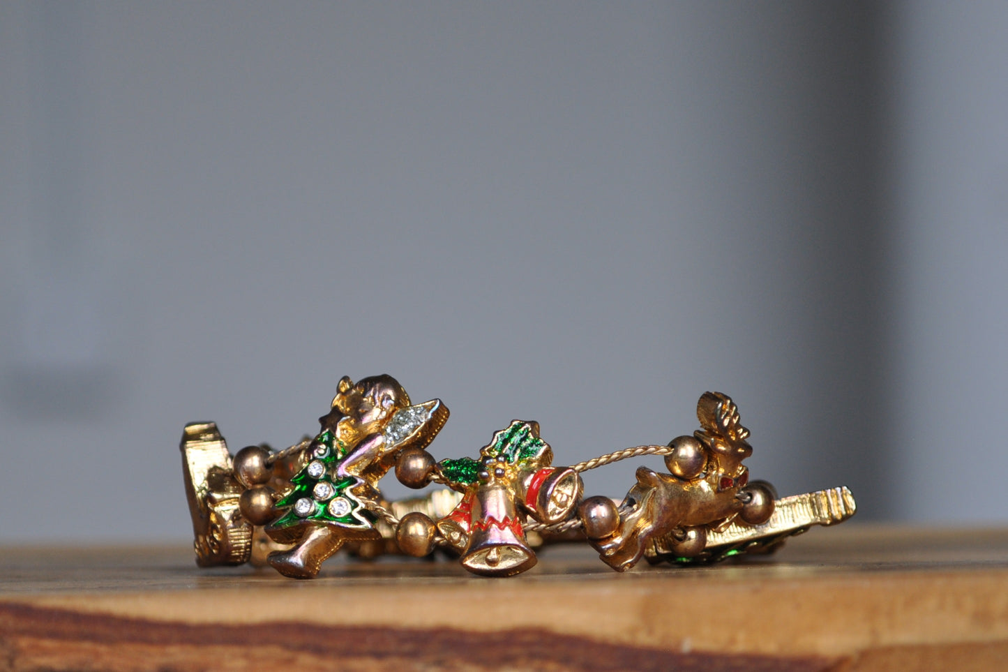 Festive Tofa Gold Tone Enamel Sliding Charm Christmas Bracelet - 8 Inches - Presents, Trees, Bells