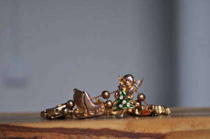 Festive Tofa Gold Tone Enamel Sliding Charm Christmas Bracelet - 8 Inches - Presents, Trees, Bells