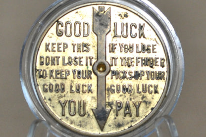 "Packaged for Pleasure" 50th Anniversary Cartan Tours Souvenir Token - Cartan Tours Anniversary, Goodluck, and Spinner Token