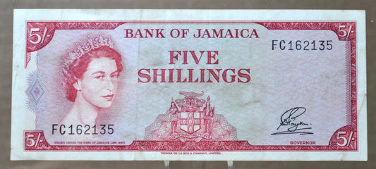 1964 Bank of Jamaica 5 Shillings Note - Signature 1, Gothic Font - Queen Elizabeth II - 1964 British Jamaica Five Shillings Note - P#51Aa