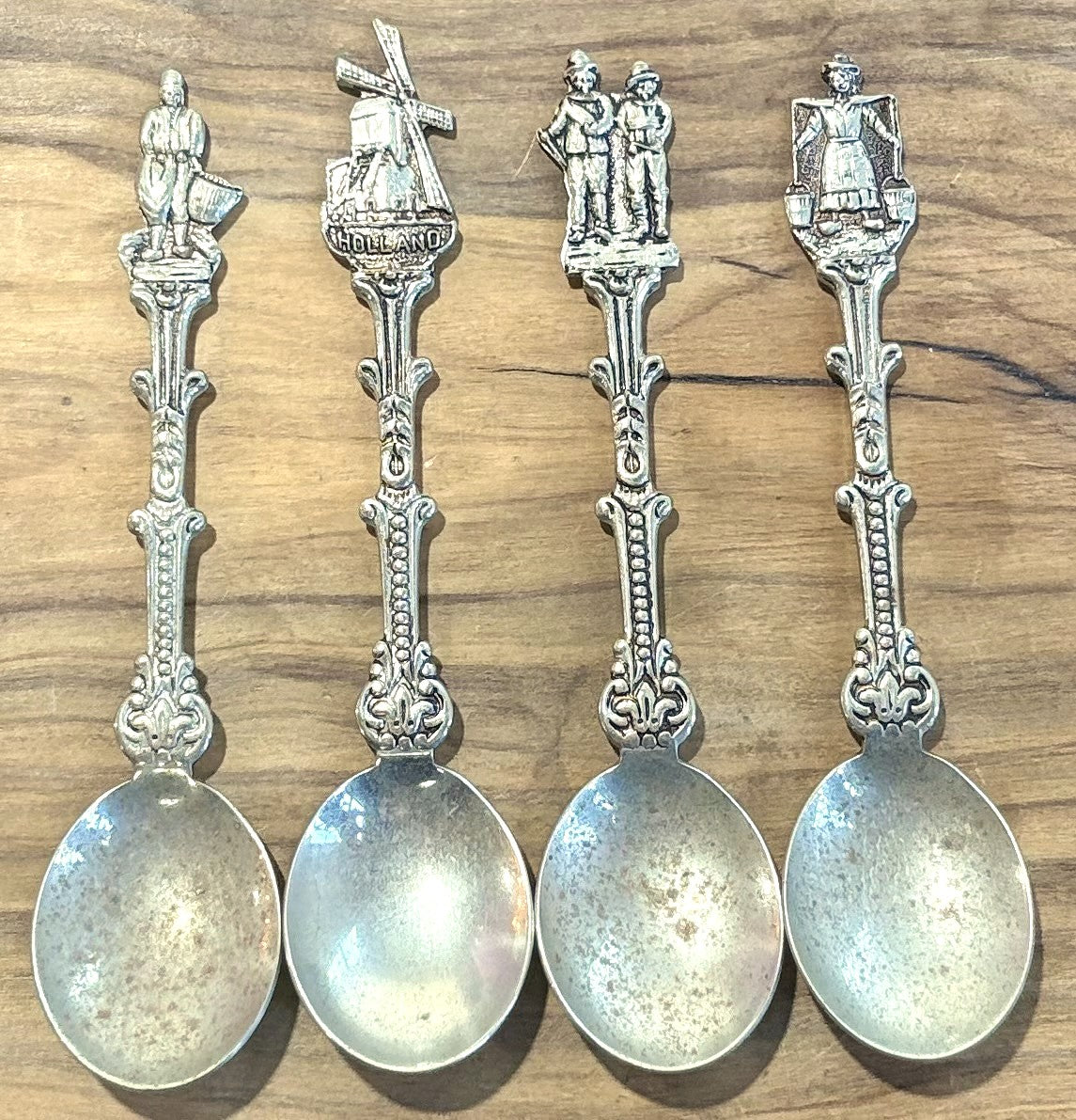 Vintage H.v.d.M. Dutch Silver Plated Souvenir Spoons Set - 8-Piece Holland Windmill and Traditional Figure Souvenir Spoon Collection - Collectible Holland-Themed Demitasse Spoons