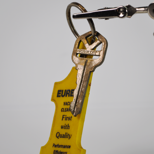 Vintage Eureka Vacuum Cleaner Yellow Plastic Key Fob Keychain with Kwikset Key - Collectible Yellow Eureka Vacuum Advertising Key Fob