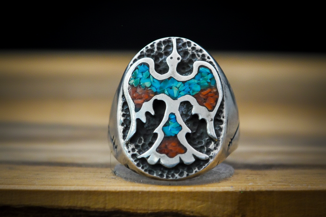 Silver ring with a colorful eagle design. Native American with Coral Inlay