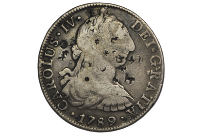1789 Spanish 8 Reales featuring the bust of King Carolus IV and chop marks from various places / merchants