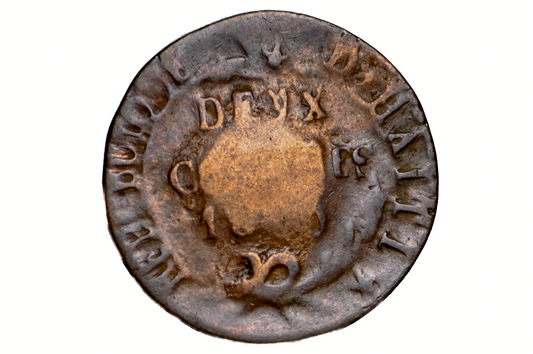 Ancient coin with engraved text and design on a white background