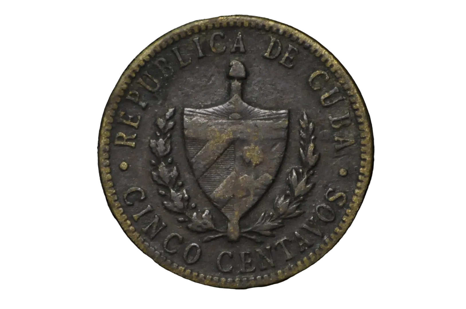 Old coin with 'Republica de Cuba' text and shield design on a black background