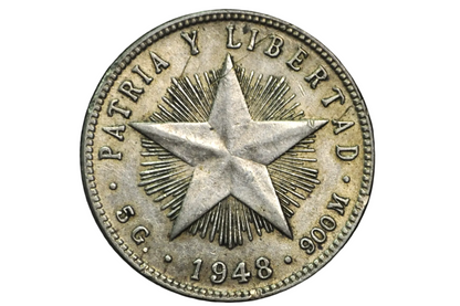 Vintage coin with star design and text on a black background