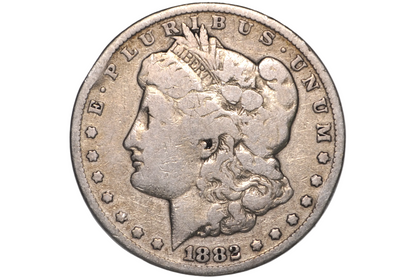 An 1882 Morgan Dollar silver coin inside a clear plastic protective holder, shown in a close-up studio shot.