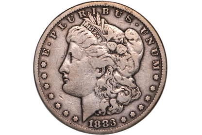 An 1883 Morgan Dollar coin in a clear plastic grading holder, showing the Liberty head profile with 'E PLURIBUS' and '1883' visible.