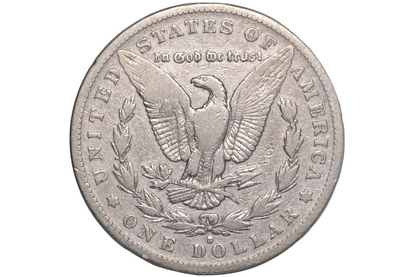 A silver US one dollar coin featuring an eagle and the text 'In God We Trust' and 'United States of America', displayed inside a clear plastic protective capsule.