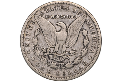 A silver United States one dollar coin featuring the eagle design and 'In God We Trust' inscription, displayed inside a clear plastic protective capsule.