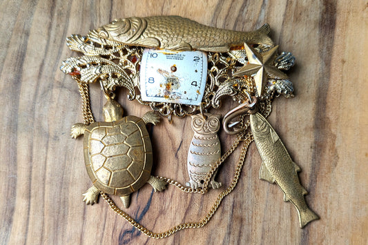 Extremely Weird Homemade Piece of Jewelry - Clock/Pin/Charm - Weird Animal Jewelry Glued Together