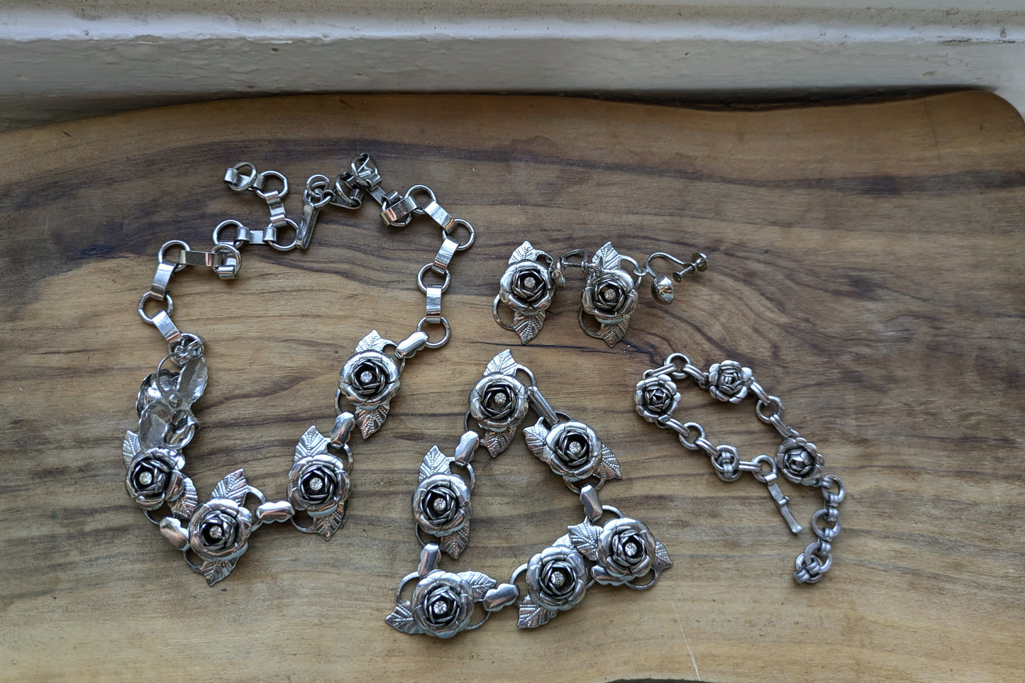 Set of Silvertone Rose Rhinestone Jewelry - Necklaces, Bracelets, & Earrings - Silver Rose Jewelry