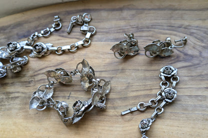 Set of Silvertone Rose Rhinestone Jewelry - Necklaces, Bracelets, & Earrings - Silver Rose Jewelry