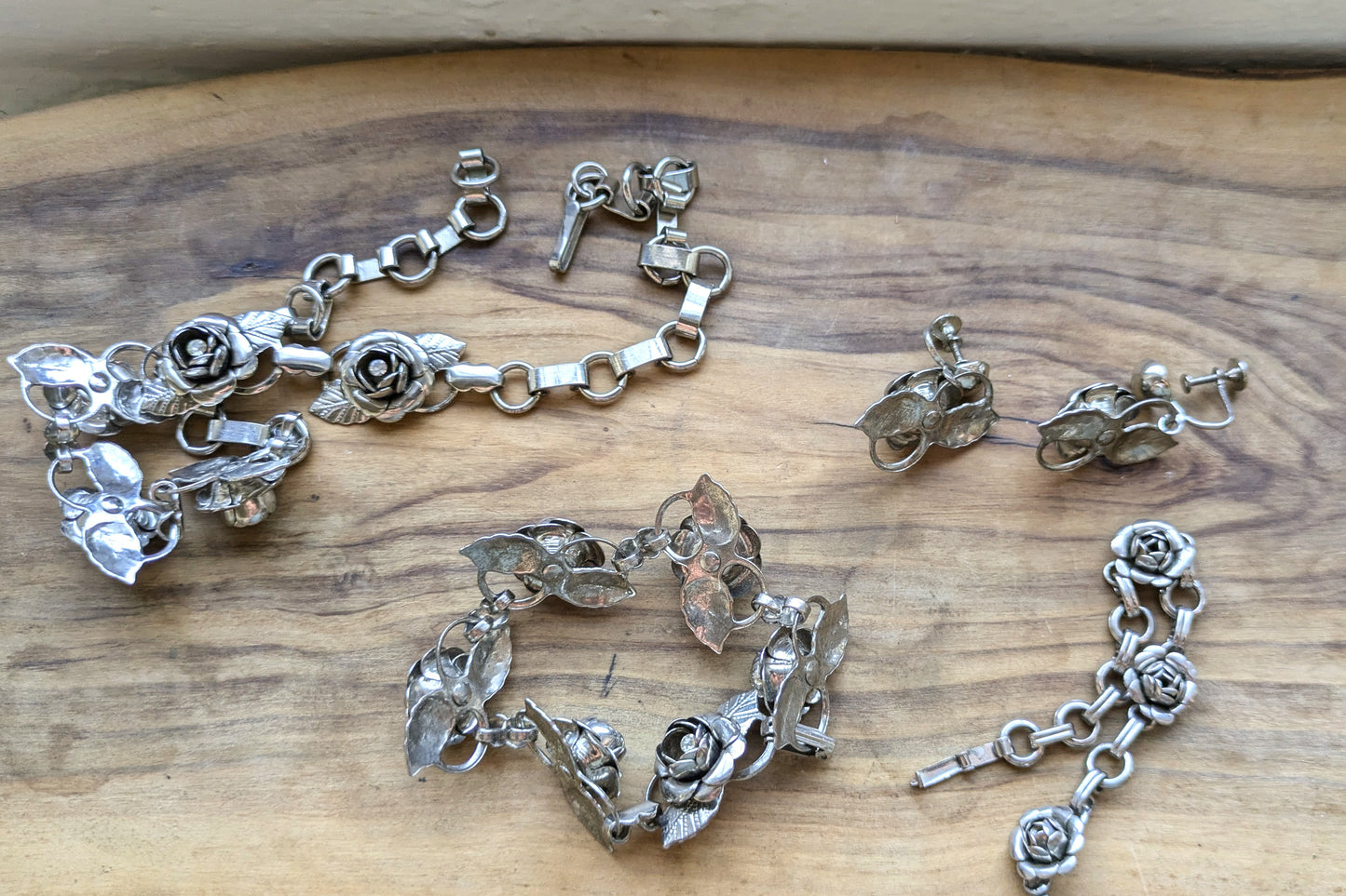 Set of Silvertone Rose Rhinestone Jewelry - Necklaces, Bracelets, & Earrings - Silver Rose Jewelry