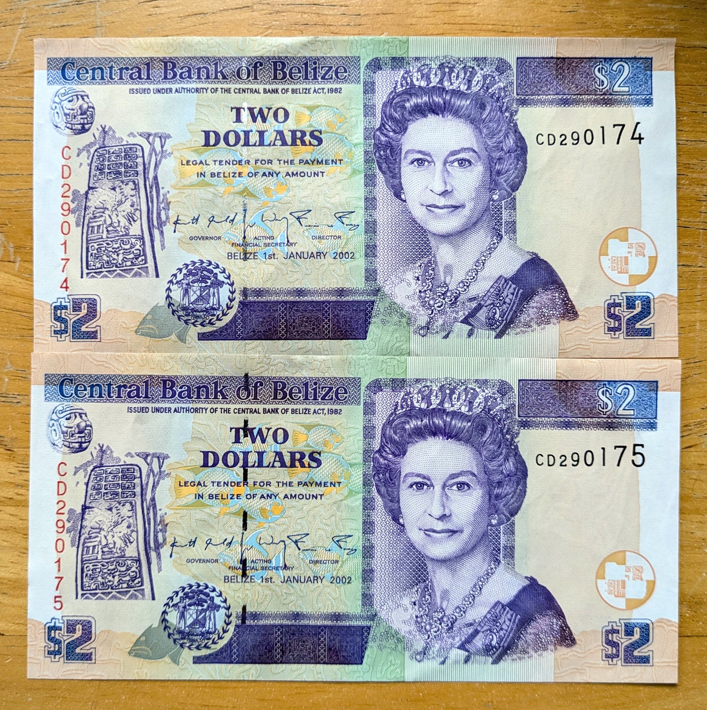 Consecutive Pair of 2002 Belize 2 Dollar Notes - Issued Jan. 1st, 2002 - 2002 British Belize Two Dollars Sequential Banknotes - P#60b