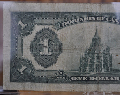 1923 One Dollar Dominion of Canada - VF (Very Fine) - Purple Seal, C Series, Very Rare Type for this Note - McCavour-Saunders - Higher Grade