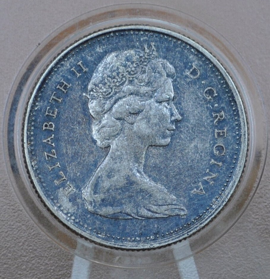1967 Canadian Silver Quarter - BU (Uncirculated), Prooflike - 80% Silver - Queen Elizabeth II Silver Commemorative Quarter 1967 Canada