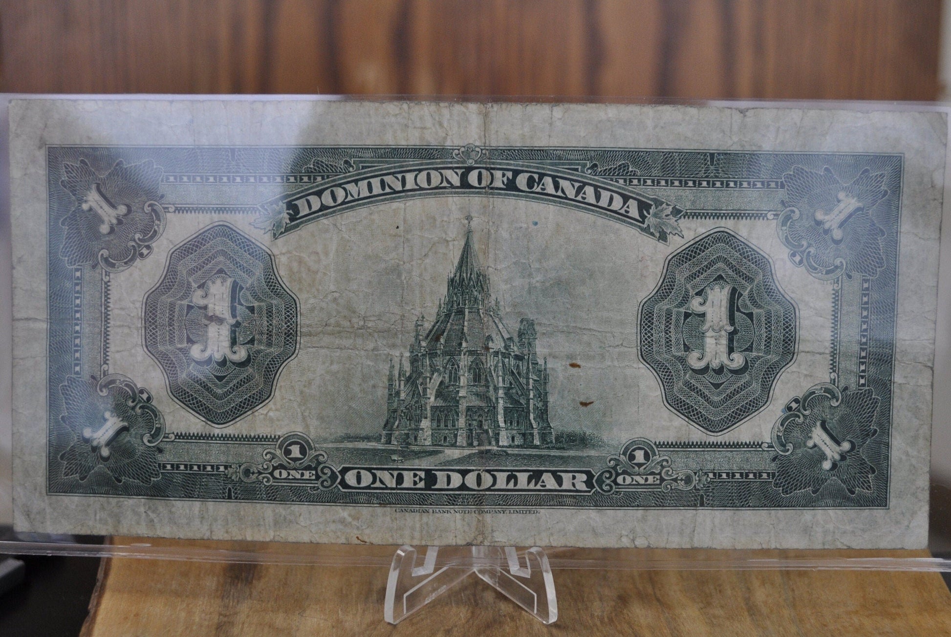 1923 One Dollar Dominion of Canada - VF (Very Fine) - Purple Seal, C Series, Very Rare Type for this Note - McCavour-Saunders - Higher Grade