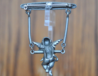 Awesome Vintage Pin! Pewter, Cherub Hanging on Trapeze - JJ Jewelry