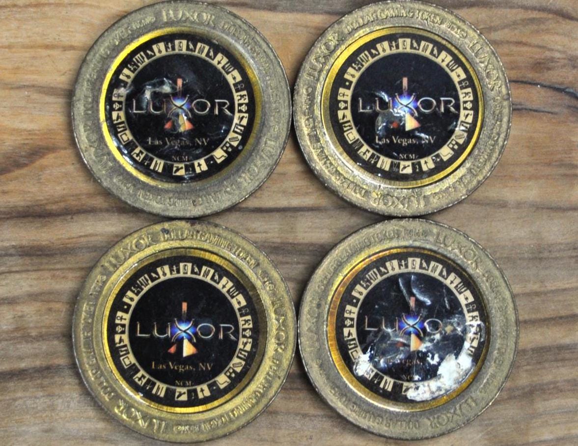 Luxor Casino 1 Dollar Gaming Token - Egyptian Themed Gaming Tokens - Luxor Casino, Las Vegas - Pyramid Casino