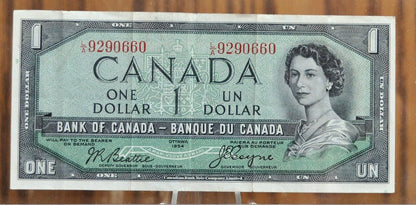 1954 Canadian 1 Dollar Banknote - Devil's Face Hairdo Issue - Beattie/Coyne Signatures - 1954 One Dollar Devil's Hair Canada Note - P#66b