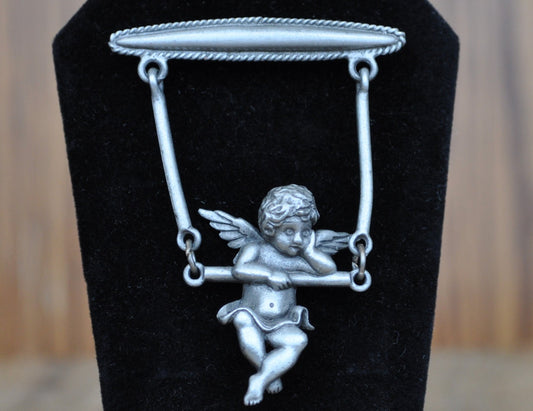 Awesome Vintage Pin! Pewter, Cherub Hanging on Trapeze - JJ Jewelry